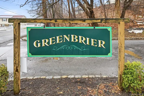 a sign broad on the side of the road