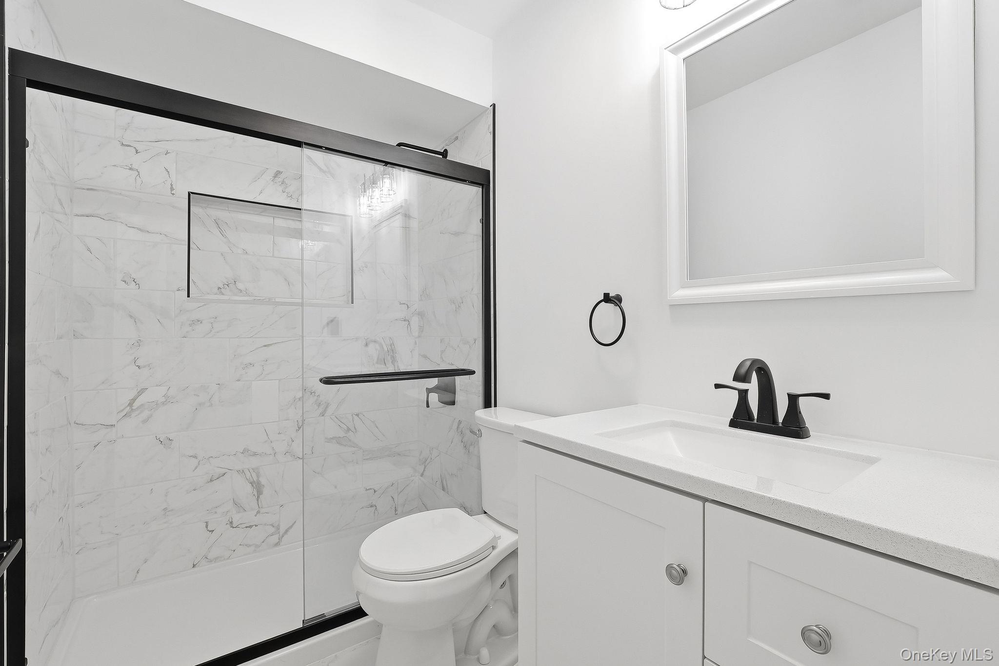 20 Pierces Road, Unit 36 Newburgh, NY 12550 - Photo 28 of 36 a bathroom with a sink toilet and shower