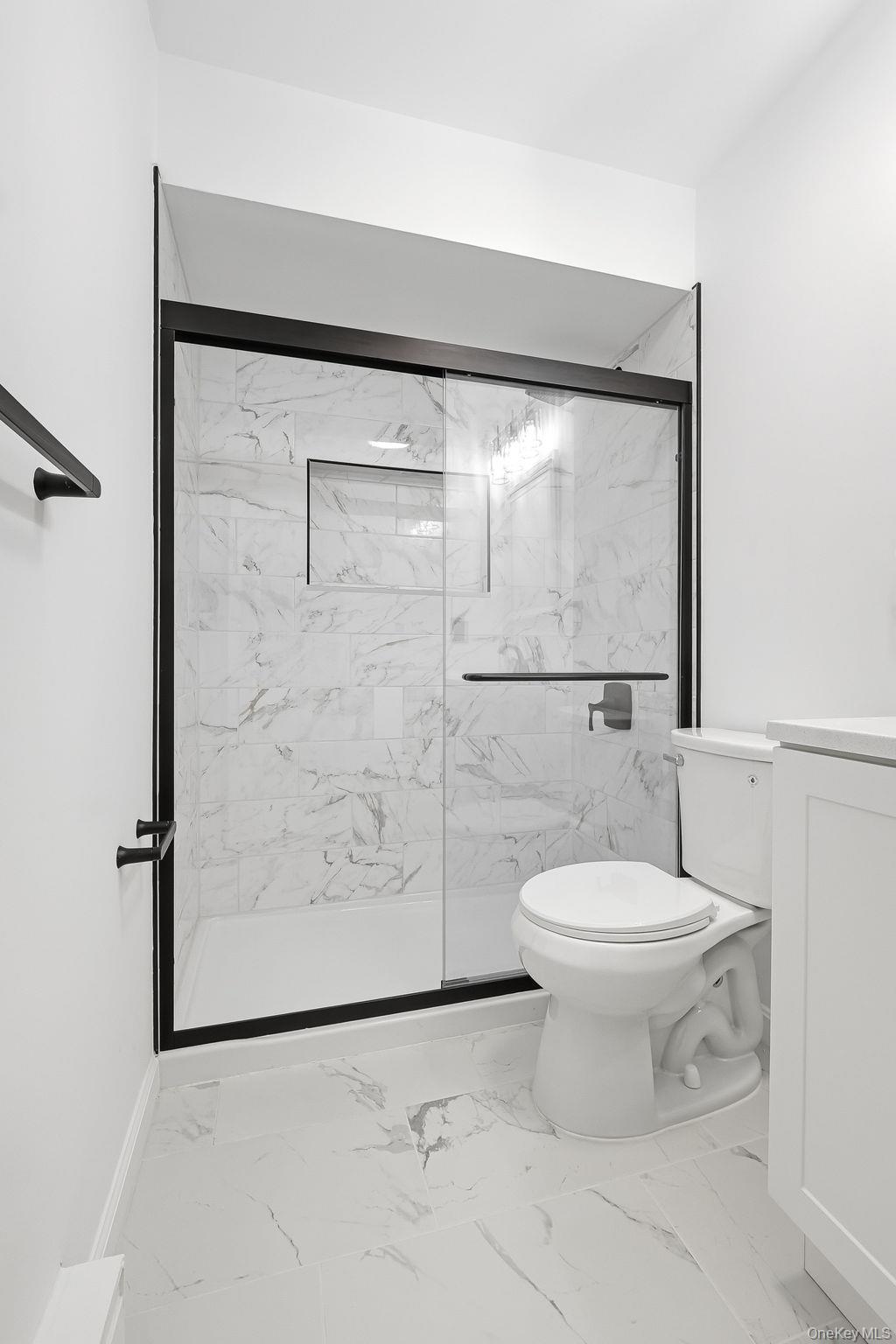 20 Pierces Road, Unit 36 Newburgh, NY 12550 - Photo 29 of 36 a bathroom with a toilet and a shower