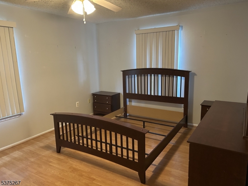 2512 Lindsley Road Bridgewater, NJ 08807 - Photo 12 of 39 a view of a balcony with wooden floor