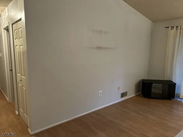a view of a hallway and staircase