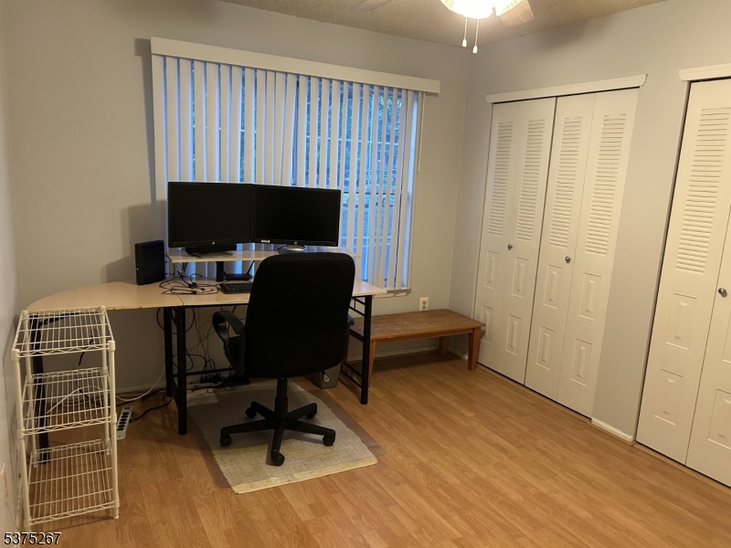 2512 Lindsley Road Bridgewater, NJ 08807 - Photo 32 of 39 a view of a workspace with furniture and a window