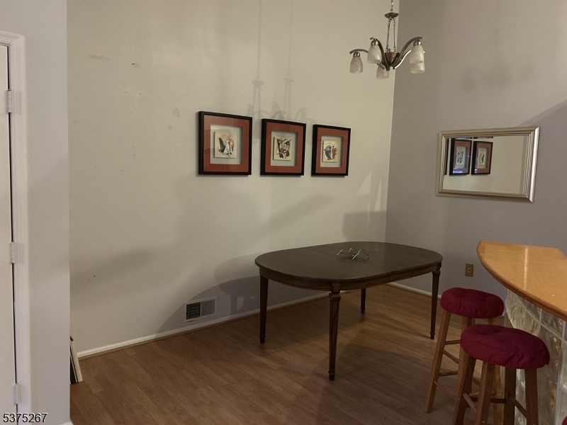 2512 Lindsley Road Bridgewater, NJ 08807 - Photo 10 of 39 a view of a room with furniture and wooden floor