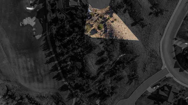 a view of a backyard of a house