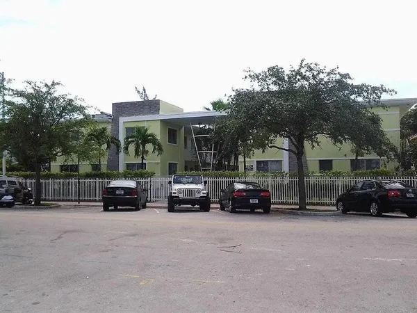 a car parked in front of a house