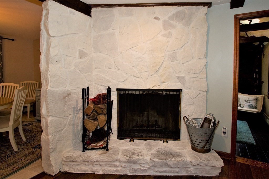 18 Boxford Road Topsfield, MA 01983 - Photo 11 of 25 a room with water heater and a fireplace