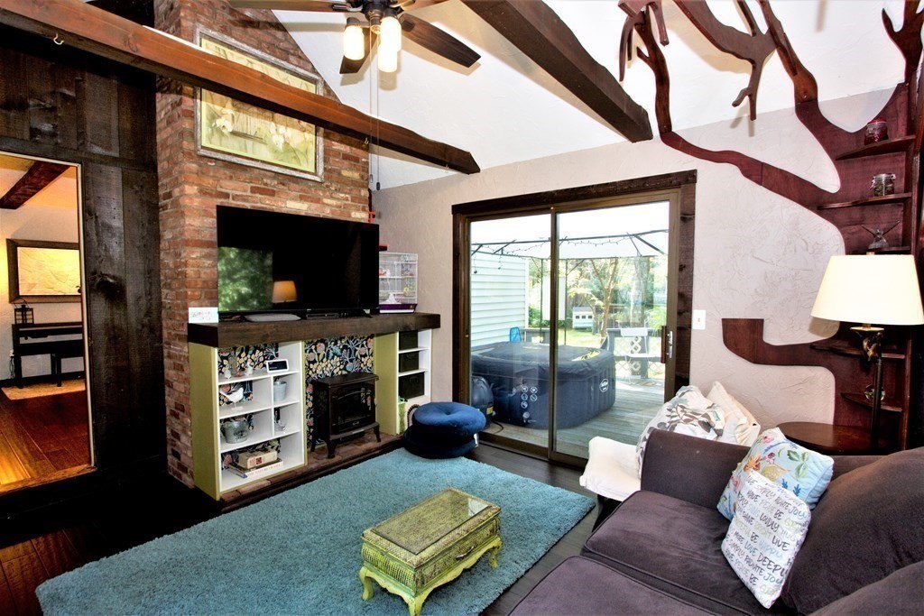18 Boxford Road Topsfield, MA 01983 - Photo 12 of 25 a living room with furniture and a fireplace
