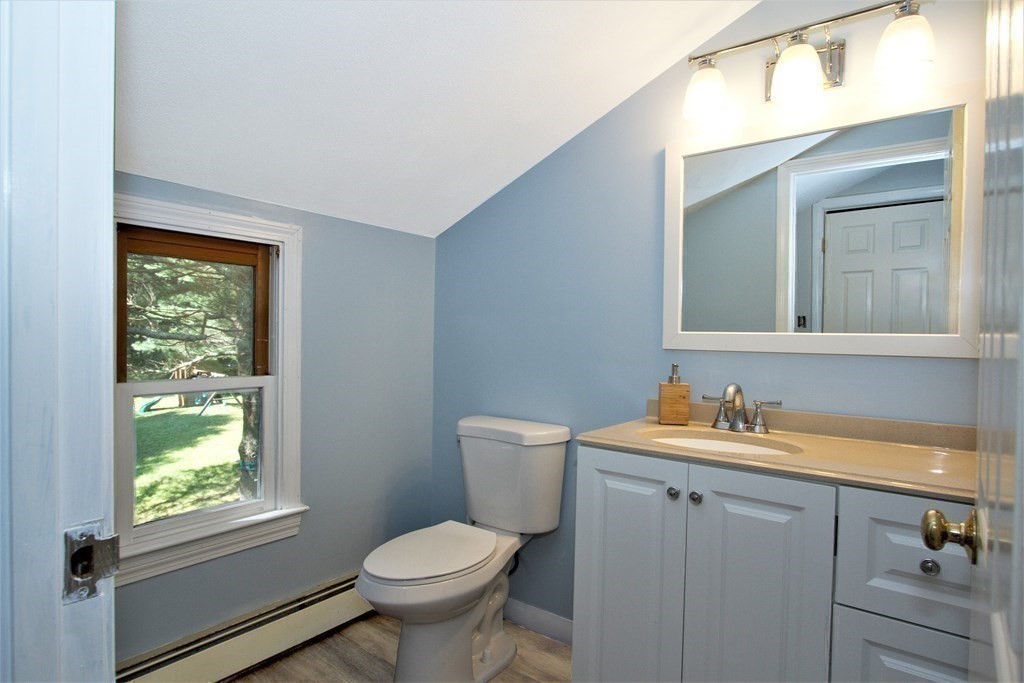 18 Boxford Road Topsfield, MA 01983 - Photo 18 of 25 a bathroom with a toilet sink and mirror