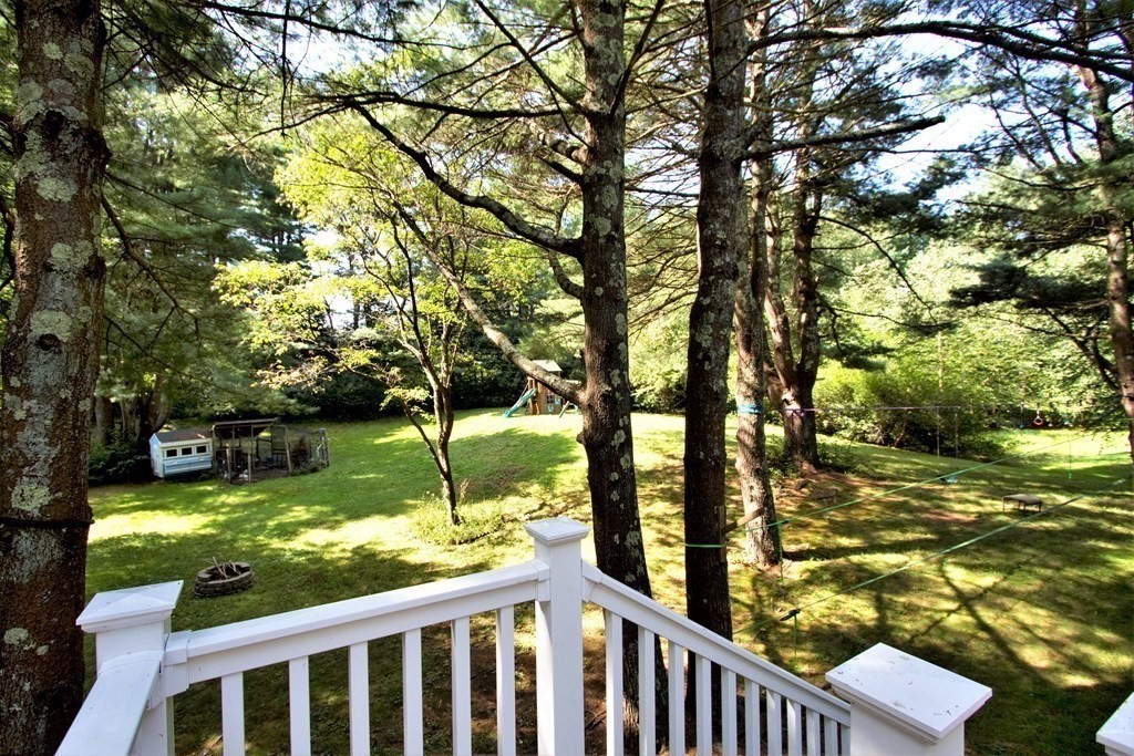 18 Boxford Road Topsfield, MA 01983 - Photo 19 of 25 a view of a yard with wooden fence