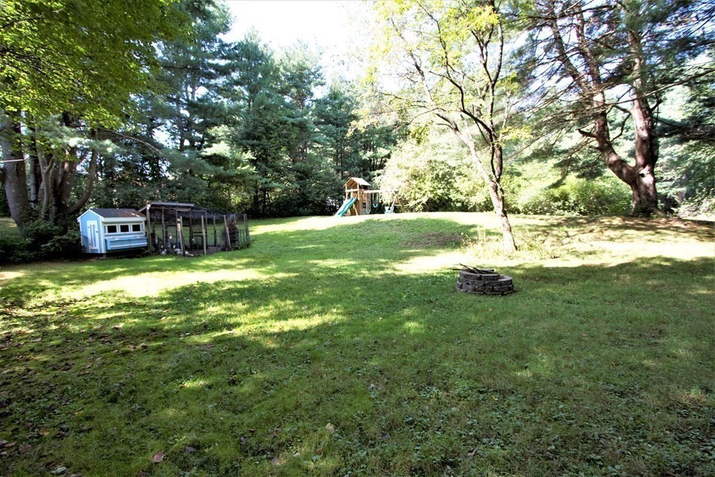 18 Boxford Road Topsfield, MA 01983 - Photo 20 of 25 a view of a yard with large trees