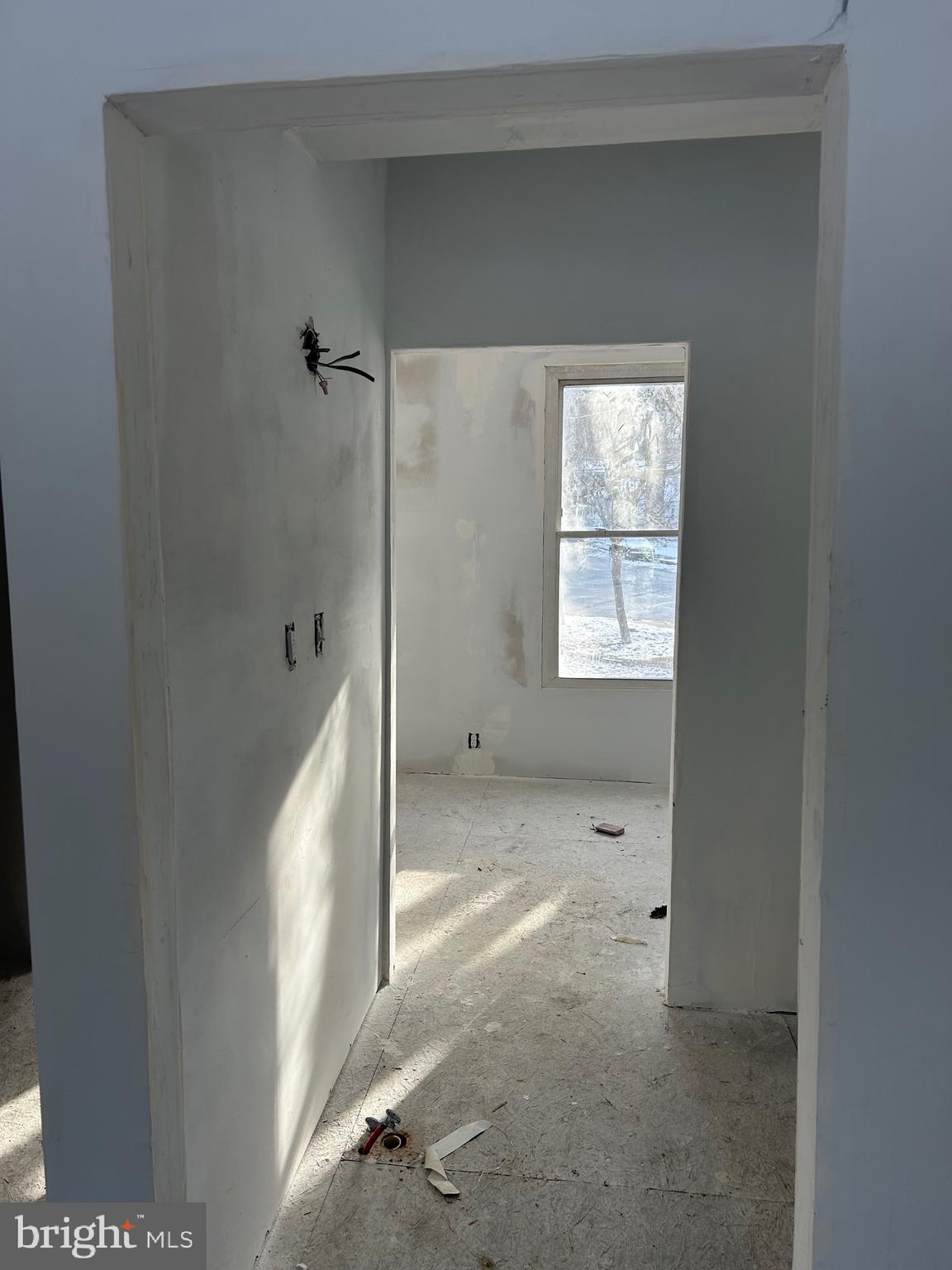 6600 Woodland Road Morningside, MD 20746 - Photo 65 of 100 a view of an empty room with a window