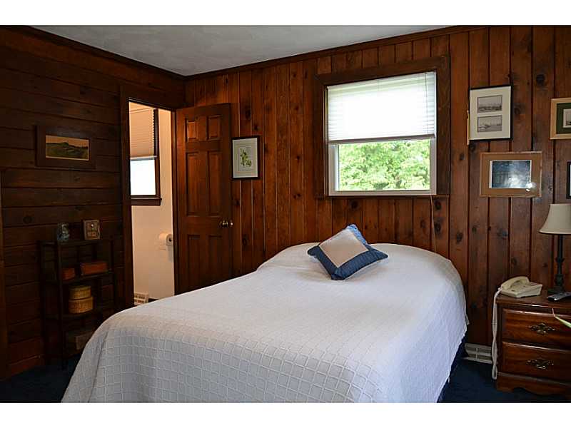 27 Norman Road Jamestown, RI 02835 - Photo 16 of 25 Master Bedroom. With cedar closet and ensuite half bath