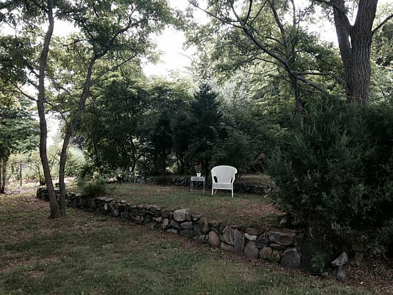27 Norman Road Jamestown, RI 02835 - Photo 7 of 25 Yard/Garden. Terraced portion of backyard could be your lovely garden.