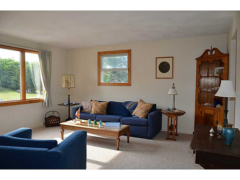 27 Norman Road Jamestown, RI 02835 - Photo 10 of 25 Living Room. Elevated with cool breezes.