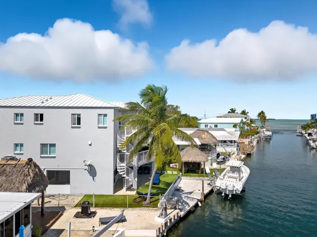 a bedroom with a bed and a view of bathroom