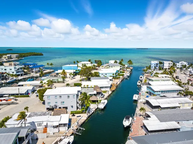 a bathroom with a toilet a sink and a bathtub