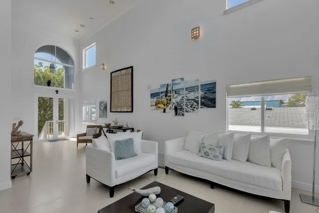 a view of a bathroom with a tub and shower