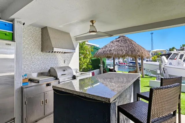 an aerial view of residential building and lake