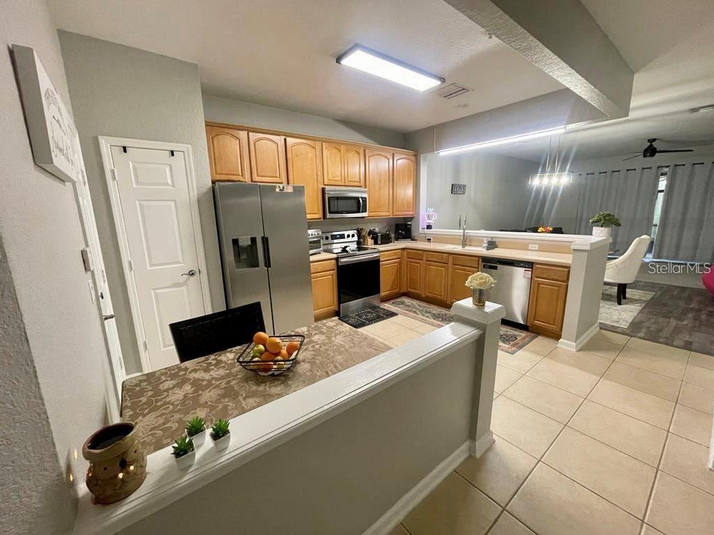 2838 Villafuerte Point, Unit 104 Orlando, FL 32835 - Photo 4 of 15