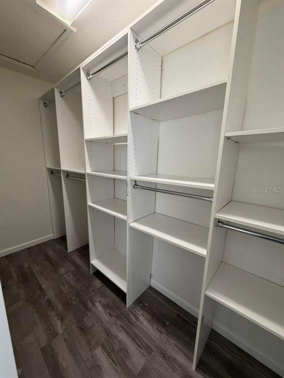 2838 Villafuerte Point, Unit 104 Orlando, FL 32835 - Photo 10 of 17 a view of an empty walk in closet