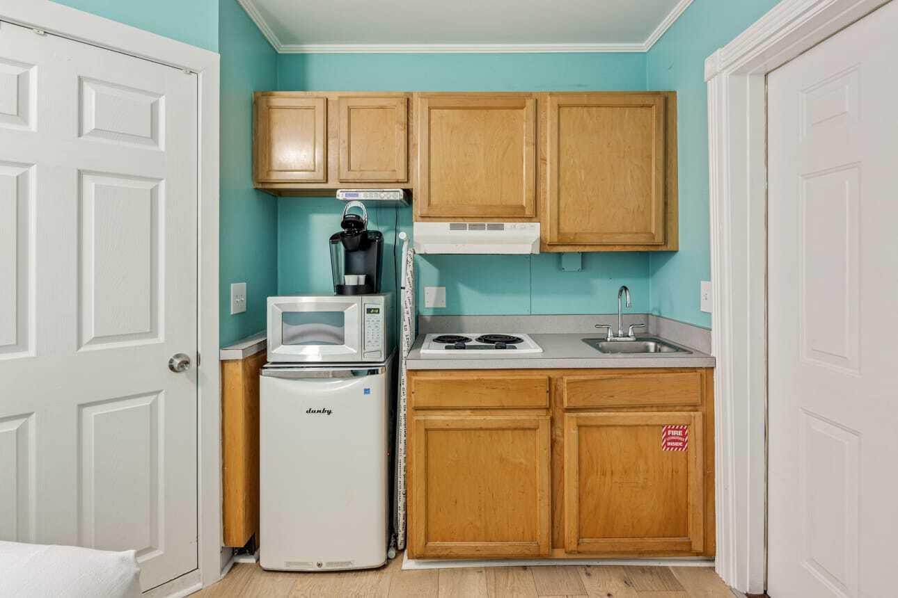 1016 Howe Street, Unit 5 Key West, FL 33040 - Photo 14 of 26 a utility room with washer and dryer
