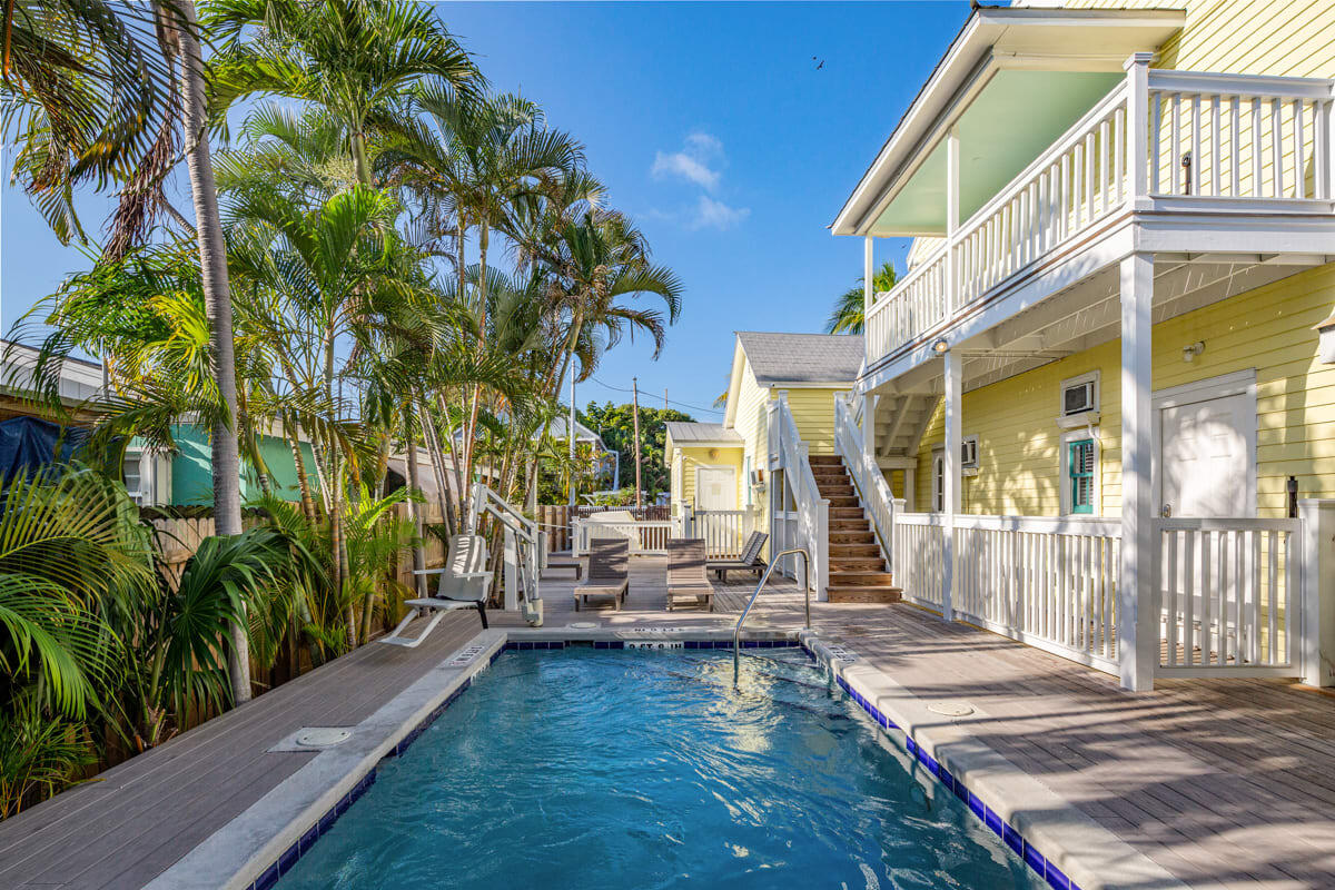 1016 Howe Street, Unit 5 Key West, FL 33040 - Photo 2 of 26 a view of a house with a yard