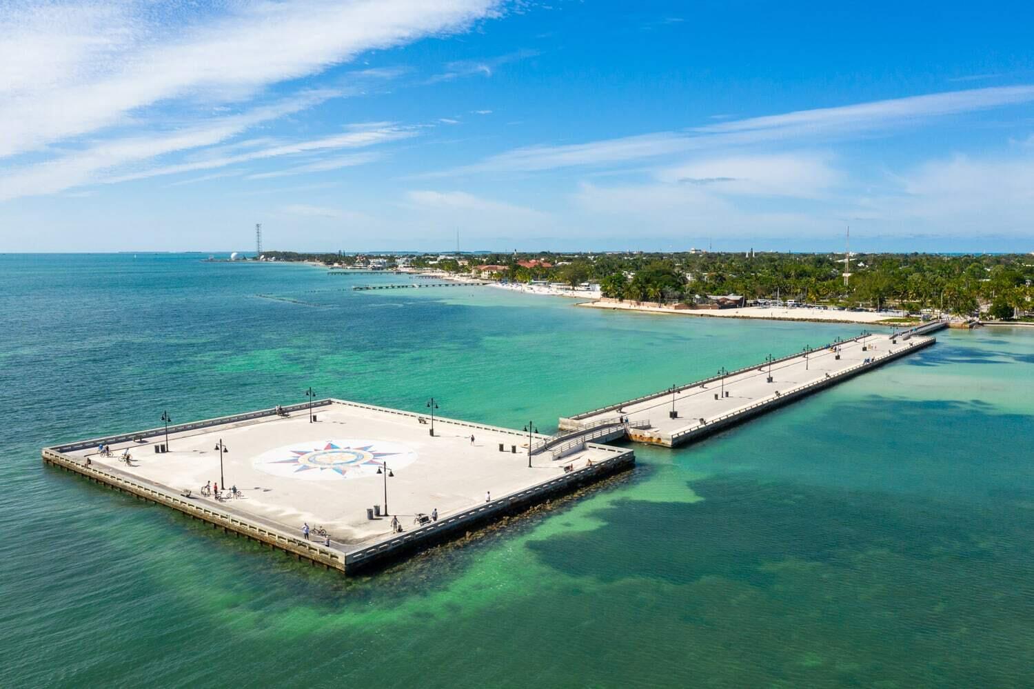 1016 Howe Street, Unit 5 Key West, FL 33040 - Photo 23 of 26 an aerial view of a golf course with chairs