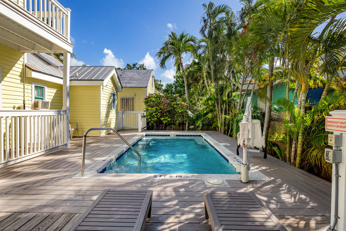 1016 Howe Street, Unit 5 Key West, FL 33040 - Photo 3 of 26 a view of a porch with a yard