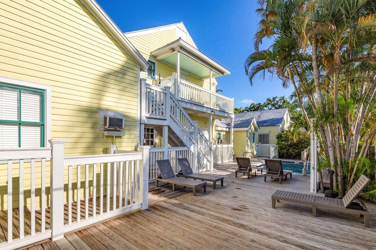 1016 Howe Street, Unit 5 Key West, FL 33040 - Photo 6 of 26 a view of a house with backyard and sitting area