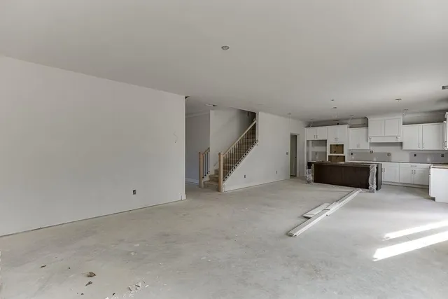 a view of a kitchen with furniture and a kitchen