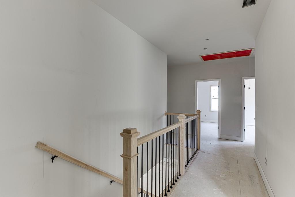 1075 Poppy Lane Jefferson, GA 30549 - Photo 18 of 36 a view of a hallway with windows