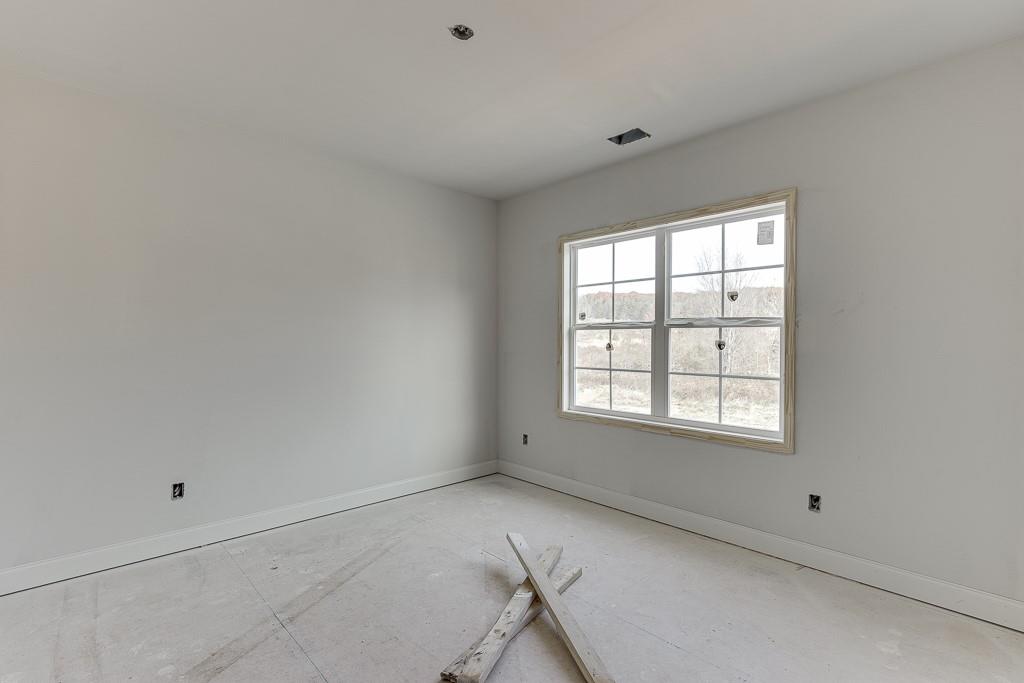 1075 Poppy Lane Jefferson, GA 30549 - Photo 21 of 36 an empty room with a window