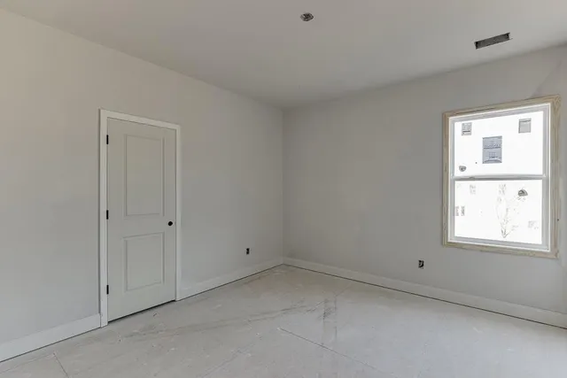 a view of room with walk in closet