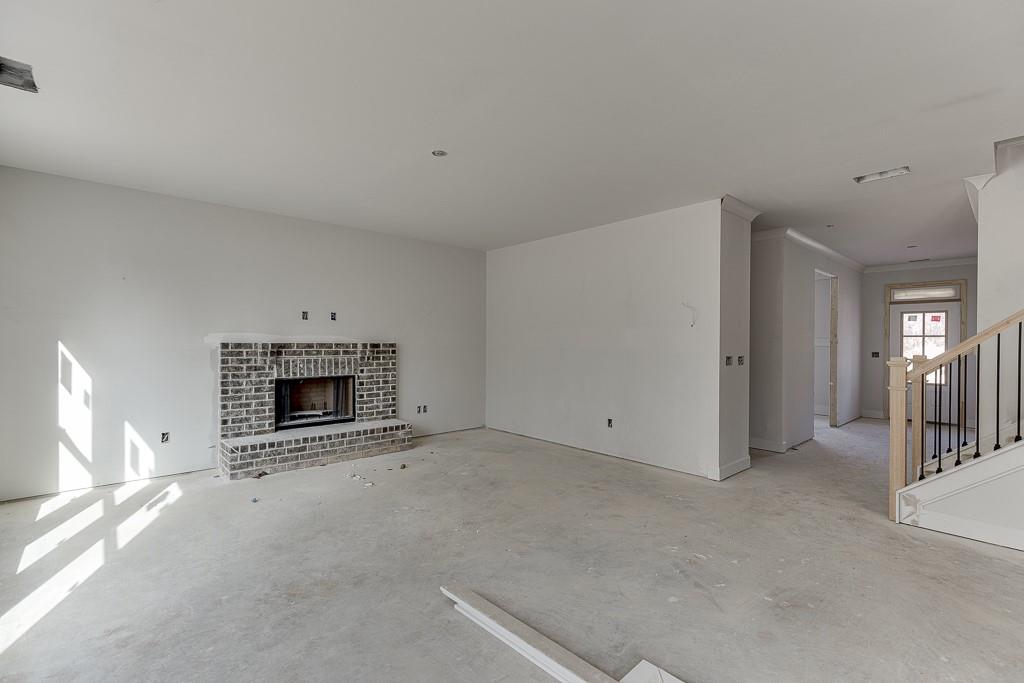 1075 Poppy Lane Jefferson, GA 30549 - Photo 10 of 36 a view of empty room with fireplace