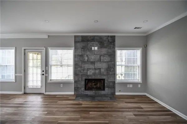 a view of an empty room with a window