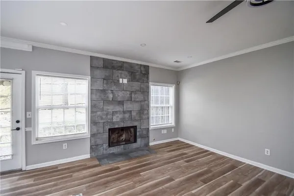 a view of an empty room with a window