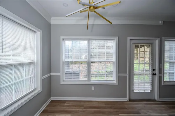 a view of a room that has a window in it