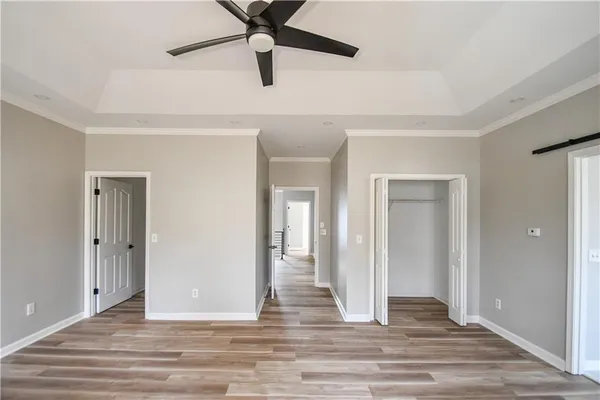 a spacious bathroom with a granite countertop tub sink and mirror