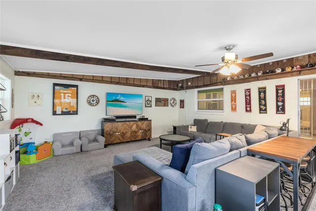 a living room with furniture and a window