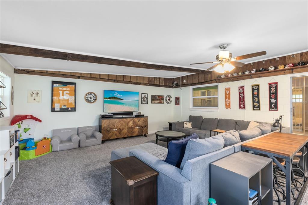 440 East Orange Street Altamonte Springs, FL 32701 - Photo 12 of 39 a living room with furniture and a window