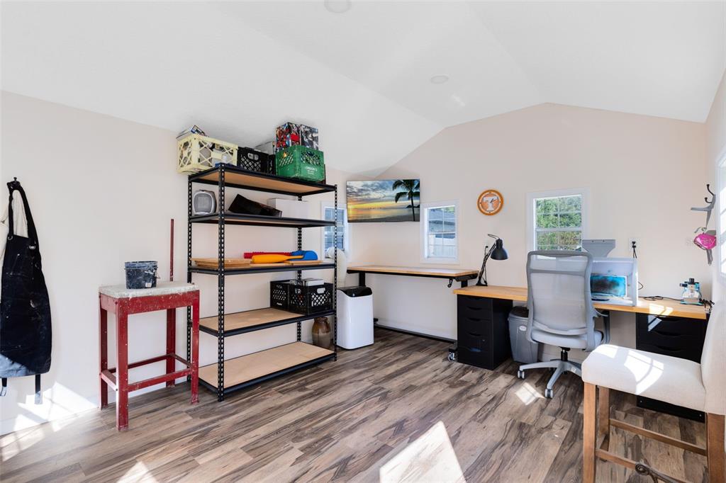 440 East Orange Street Altamonte Springs, FL 32701 - Photo 28 of 39 a living room with furniture a rug and white walls