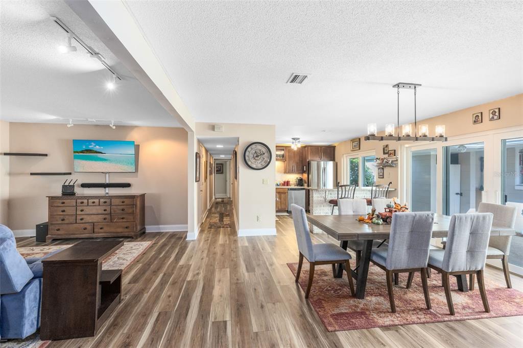 440 East Orange Street Altamonte Springs, FL 32701 - Photo 3 of 39 a view of a dining room with furniture window and wooden floor