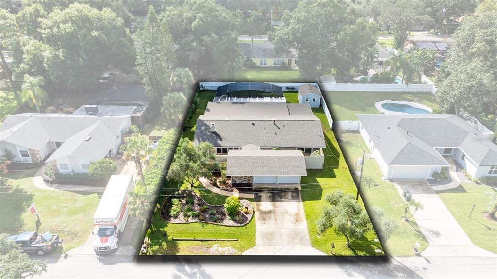 440 East Orange Street Altamonte Springs, FL 32701 - Photo 32 of 39 an aerial view of a house with a swimming pool