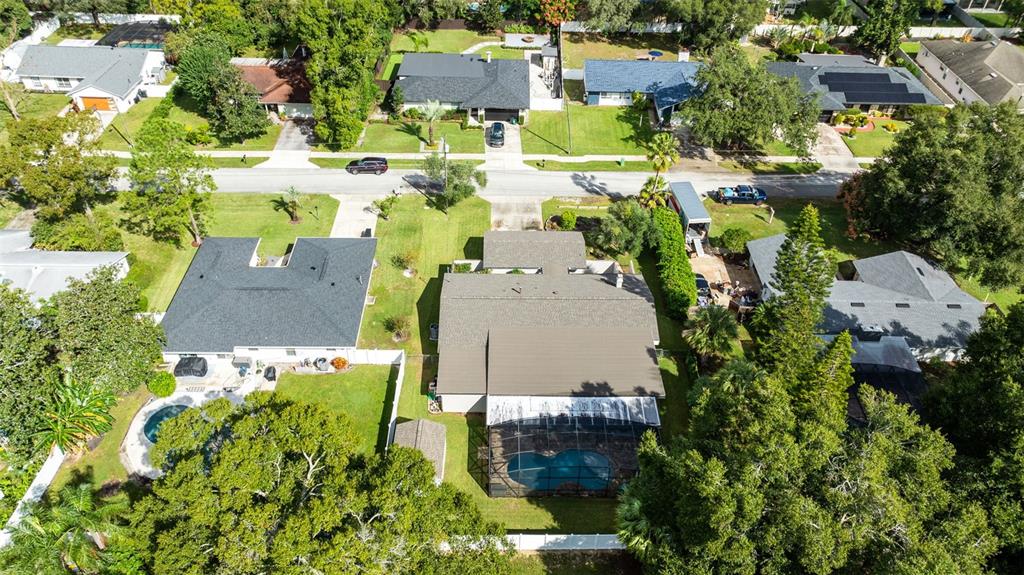 440 East Orange Street Altamonte Springs, FL 32701 - Photo 34 of 39 an aerial view of residential houses with outdoor space and trees all around