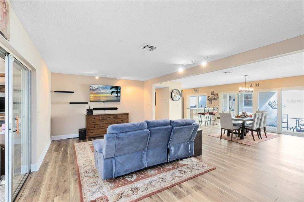 440 East Orange Street Altamonte Springs, FL 32701 - Photo 8 of 39 a living room with furniture and large windows