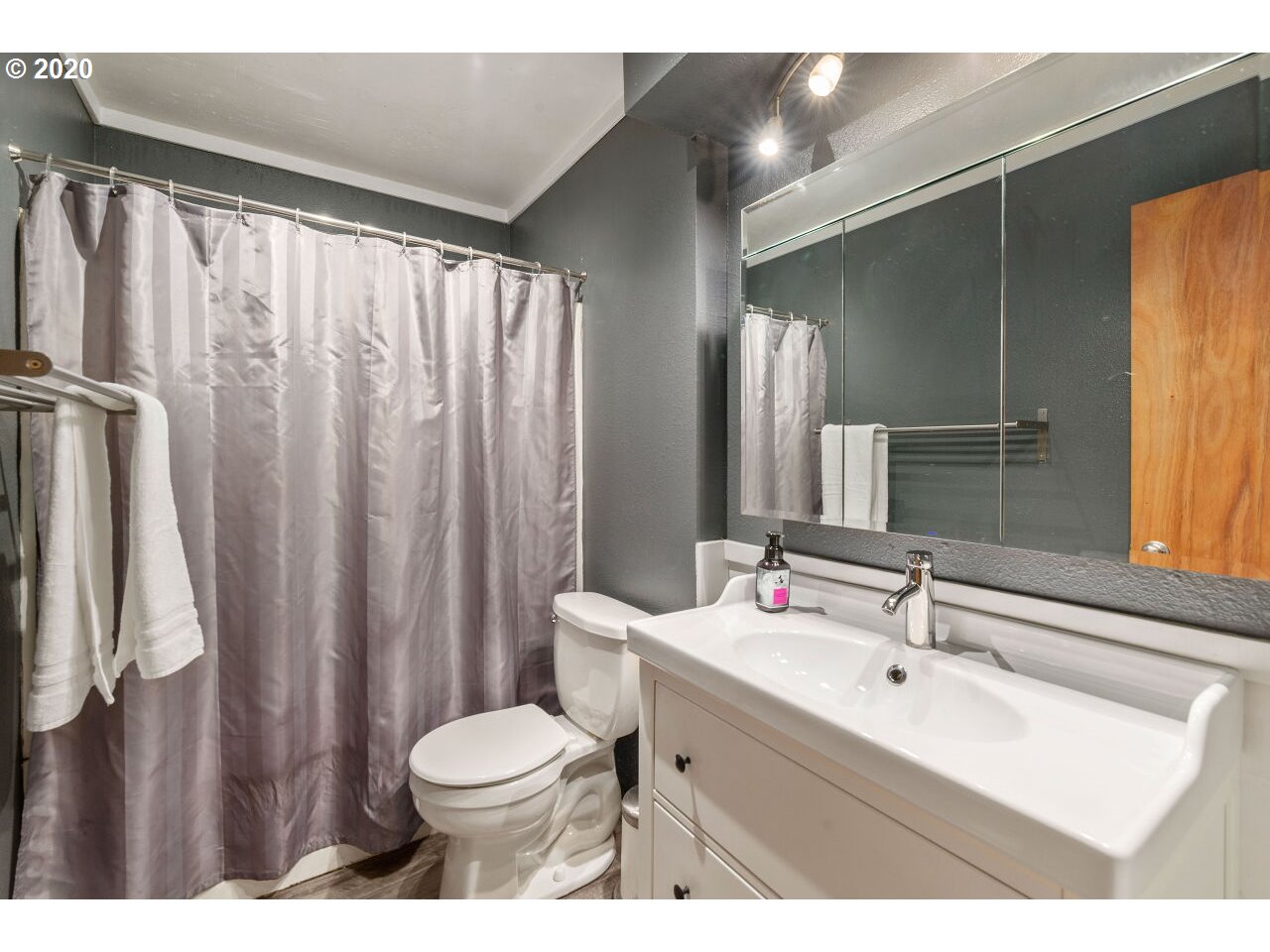 27780 East John Lake Road Rhododendron, OR 97049 - Photo 16 of 32 a bathroom with a sink toilet and shower