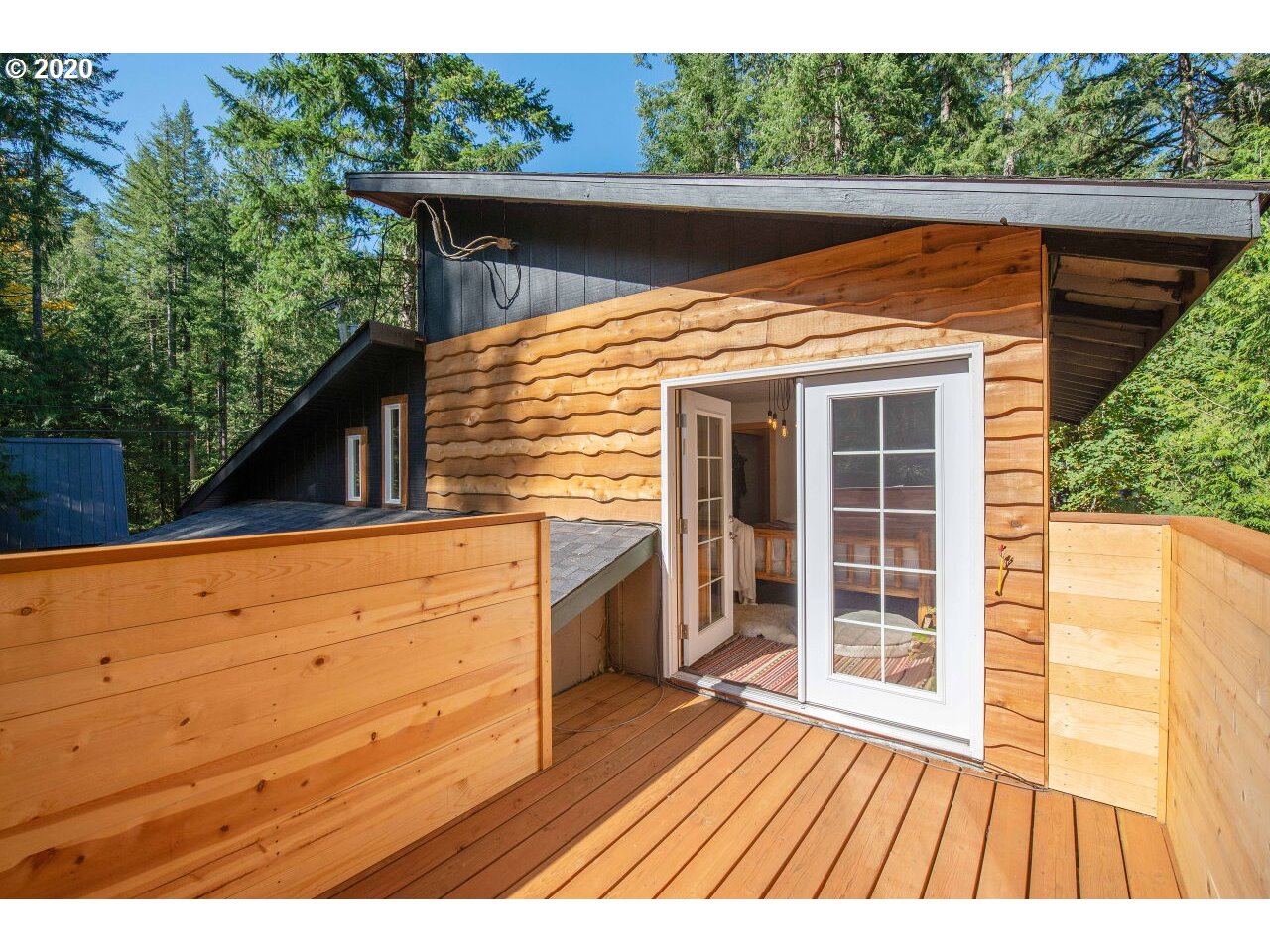 27780 East John Lake Road Rhododendron, OR 97049 - Photo 23 of 32 a view of backyard with wooden deck and floor