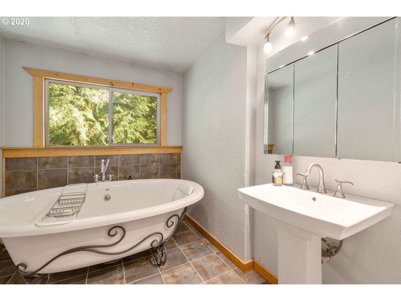 27780 East John Lake Road Rhododendron, OR 97049 - Photo 24 of 32 a bathroom with a sink and a bathtub
