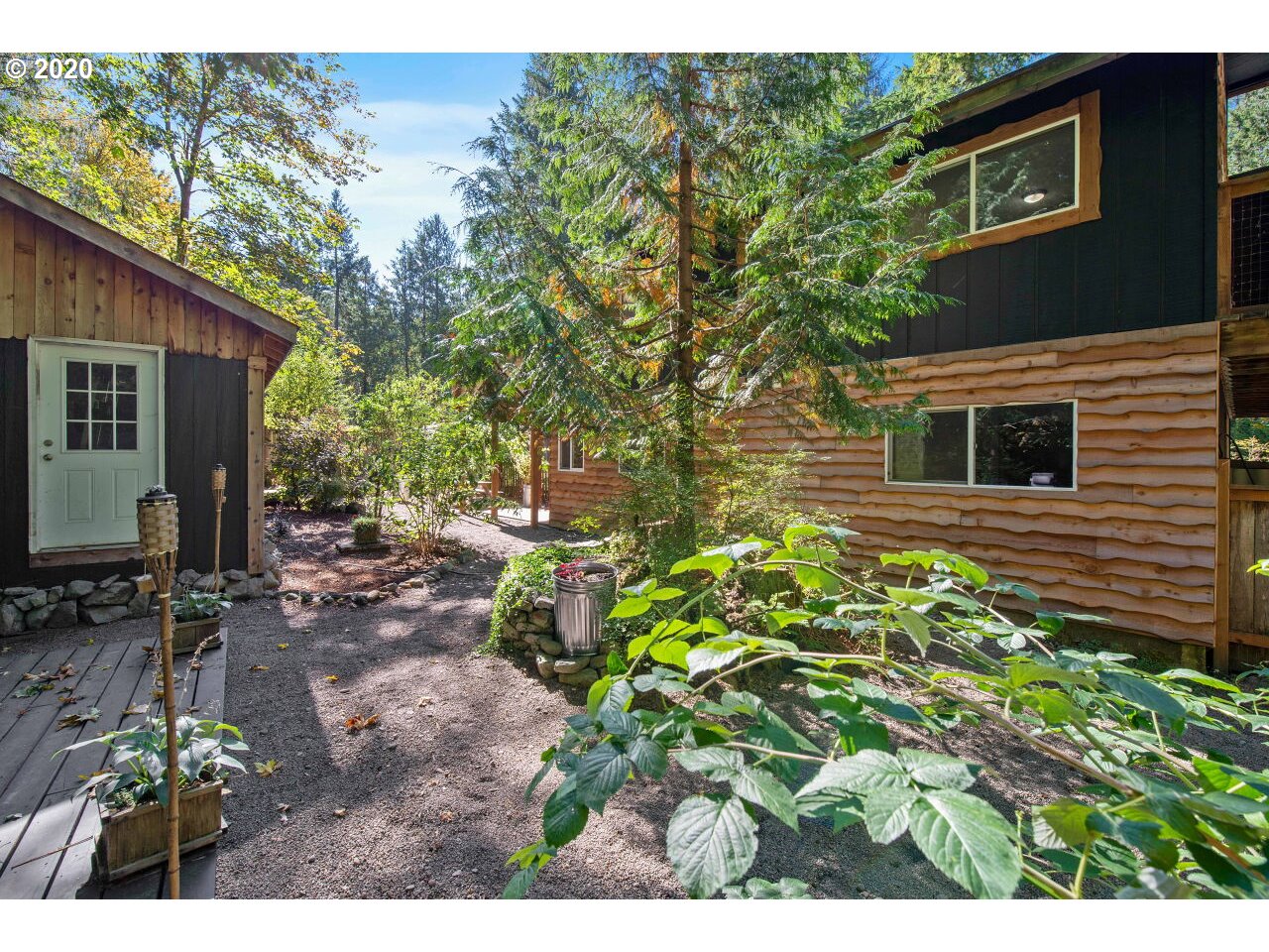 27780 East John Lake Road Rhododendron, OR 97049 - Photo 29 of 32 a backyard of a house with lots of green space
