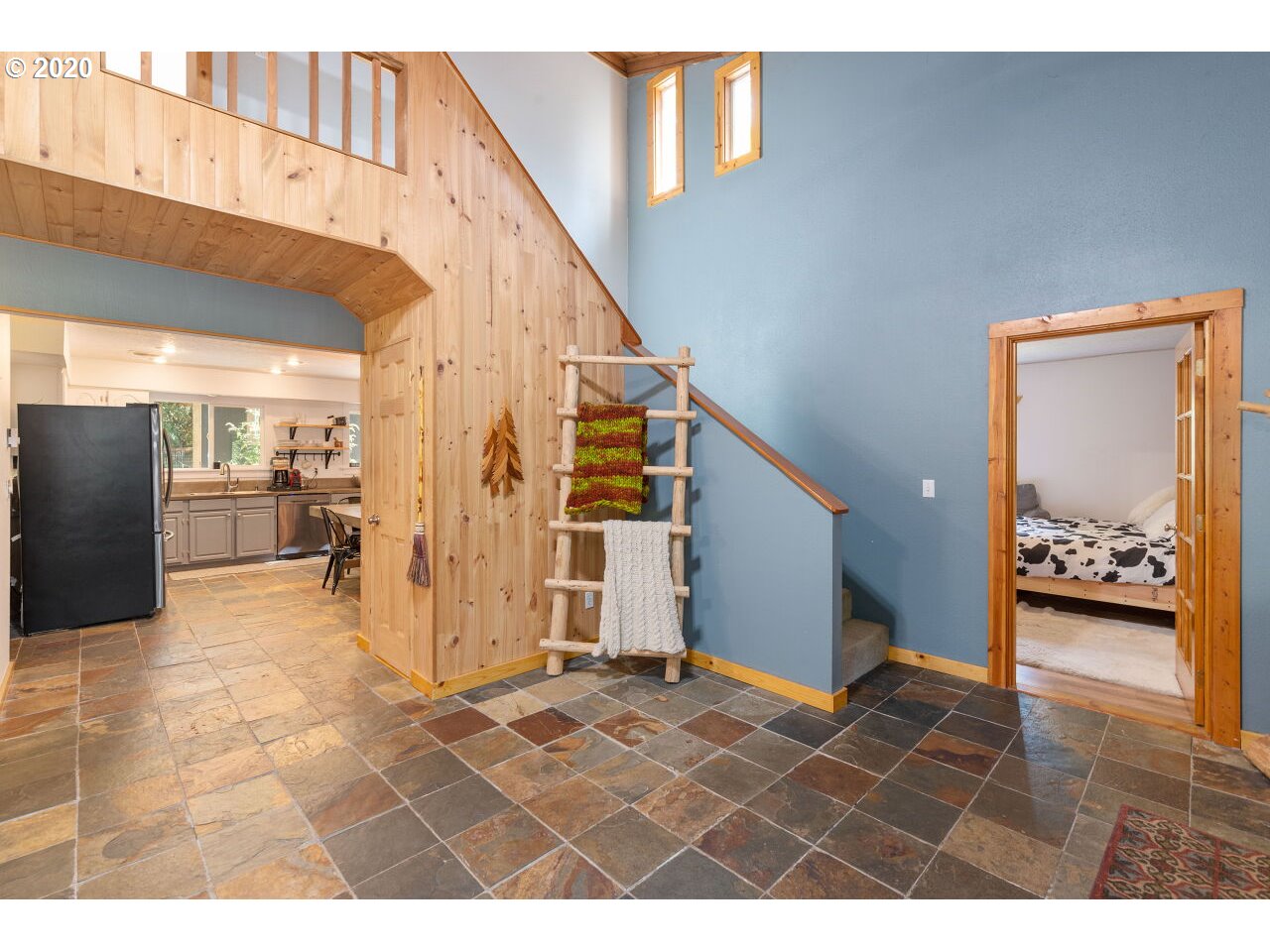 27780 East John Lake Road Rhododendron, OR 97049 - Photo 10 of 32 a view of a hallway with a living room